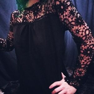 Black top with lace sleeves and trim